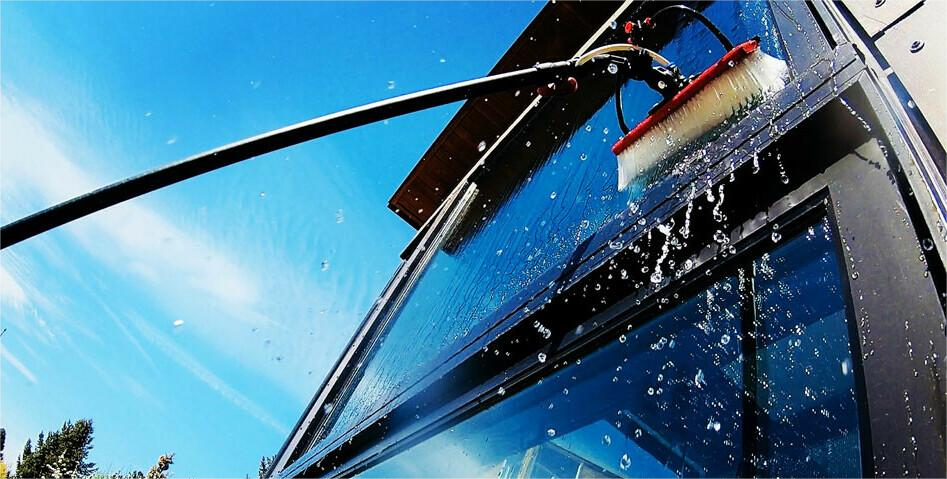 Streak-free exterior window cleaning by Mansfield Services on a Vermont home