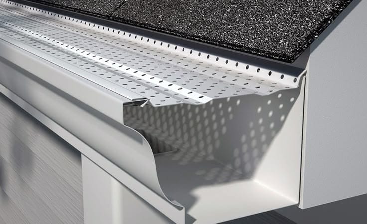 Perforated metal gutter guards installed by Mansfield Services on a Vermont home