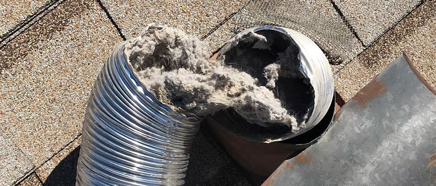 Lint buildup cleared from a dryer vent by Mansfield Services in Vermont